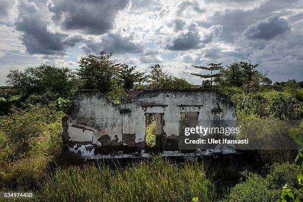 View of an abandoned house destroyed by mudflow on May 27, 2016 in Sidoarjo, East Java, Indonesia. On 29 May a mudflow eruption began in the Sidoarjo...