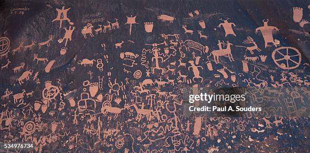 detail of newspaper rock petroglyph panel - cave painting stock pictures, royalty-free photos & images