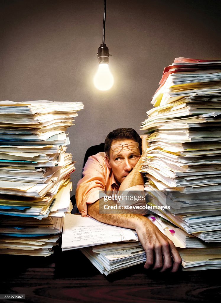 Overworked Businessman High-Res Stock Photo - Getty Images