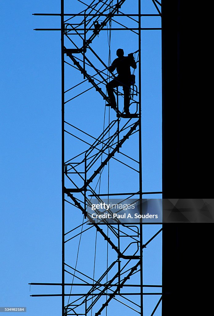Steelworker Assembling Scaffolding