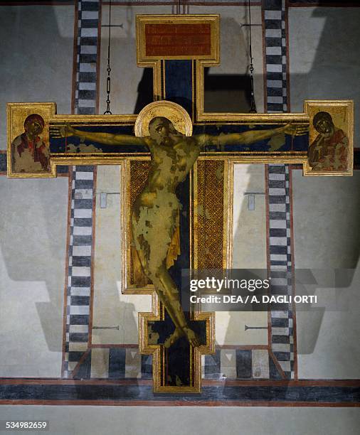 Crucifix, 1287-1288, by Cenni di Pepo known as Cimabue , tempera on panel, 448x390 cm, after the damage of the 1966 Flood, Basilica of Santa Croce,...