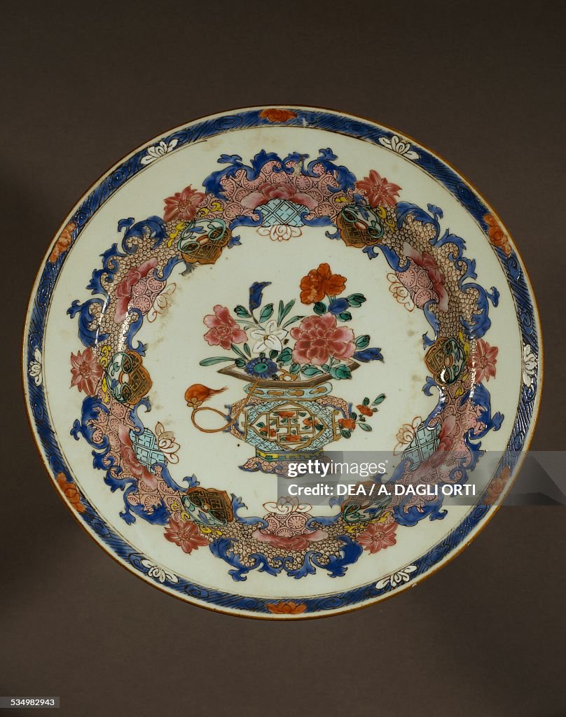 Porcelain plate with floral porcelain decorations...