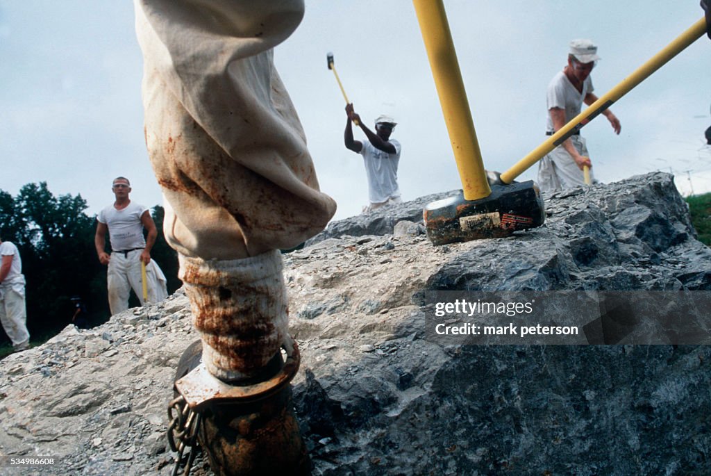Prrisoner Breaking Rocks Inmates from Limestone Correctional Facility break rocks on a chain ...