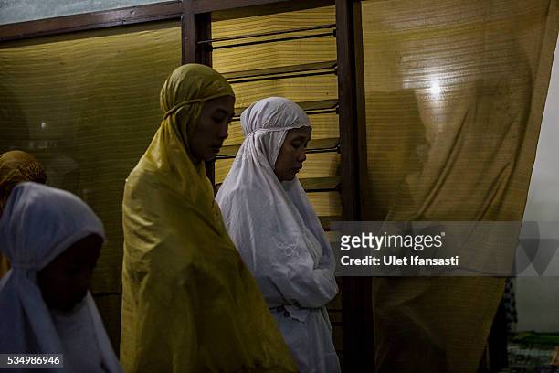 Alfita , prays at the mosque in Merisen Village on May 27, 2016 in Sidoarjo, East Java, Indonesia. The Merisen village was damaged by the Sidoarjo...