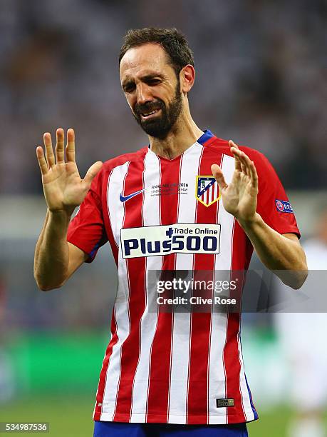 Juanfran of Atletico Madrid shows his dejection during the UEFA Champions League Final match between Real Madrid and Club Atletico de Madrid at...