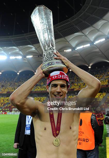 Alvaro Dominguez of Atletico Madrid celebrates with the UEFA Europa League trophy