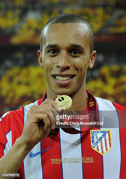 Miranda of Atletico Madrid celebrates with his medal at full-time