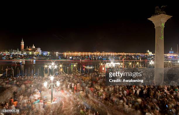 Fireworks in St Mark's basin at the end of the first day of Redentore celebrations on July 19, 2014 in Venice, Italy. Redentore is one of the most...