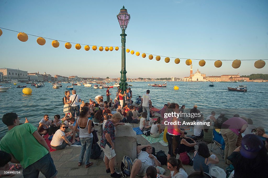 VENICE, ITALY - JULY 19: People gather on boats of all sizes at Punta della Dogana in St. Mark's Basin for the Redentore