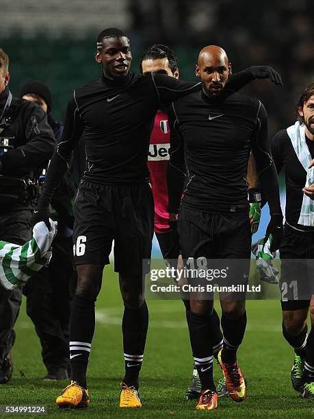 Nicolas Anelka of Juventus and team-mate Paul Pogba at full-time