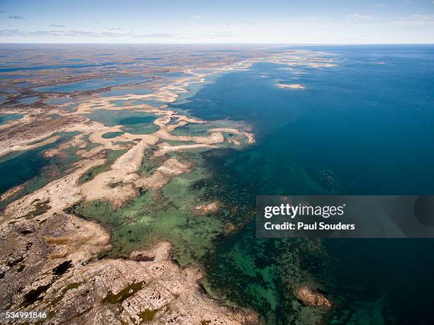aerial view of islands along hudson bay shoreline, nunavut, canada - hudson bay stock pictures, royalty-free photos & images