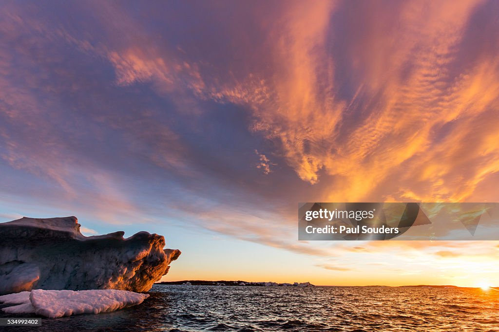 Iceberg and Midnight Sun in Repulse Bay, Nunavut, Canada