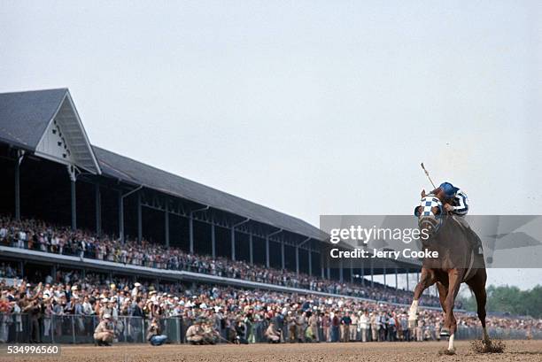 Secretariat, with Ron Turcotte up, wins the 1973 Kentucky Derby at Churchill Downs. Secretariat and Turcotte would go on to win the Preakness and the...