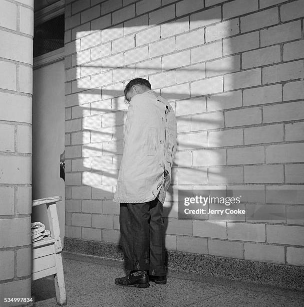 Psychiatric Hospital Patient in a Straitjacket