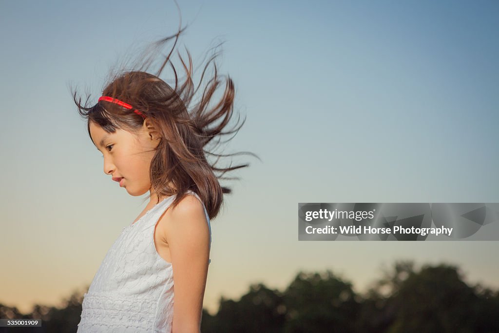 Girl feeling wind