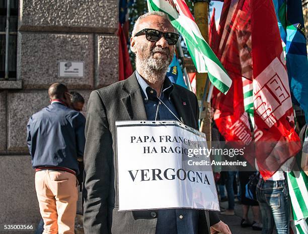 Protest with sit in is held in Milan to raise awareness about the death of hundreds of immigrants on the Sicilian coasts