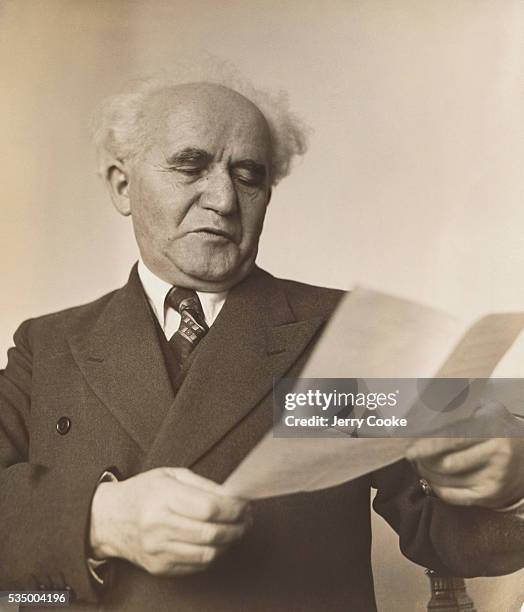 David Ben-Gurion, the first Prime Minister of Israel, reads a document.