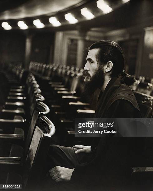 Moondog, a blind street musician, sits in Carnegie Hall during rehearsals of the New York Philharmonic at the request of the conductor, who relies on...