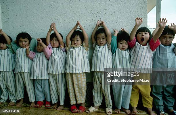 children at factory child care center - bao lac stock pictures, royalty-free photos & images