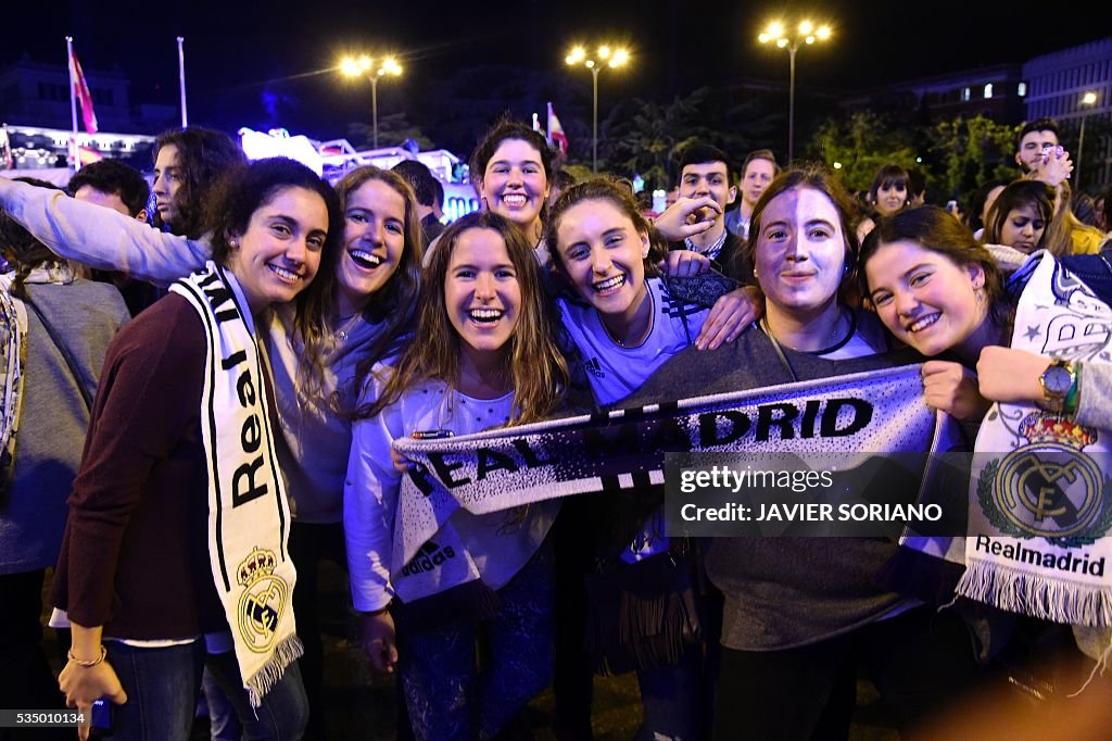FBL-EUR-C1-REALMADRID-ATLETICO-SUPPORTERS