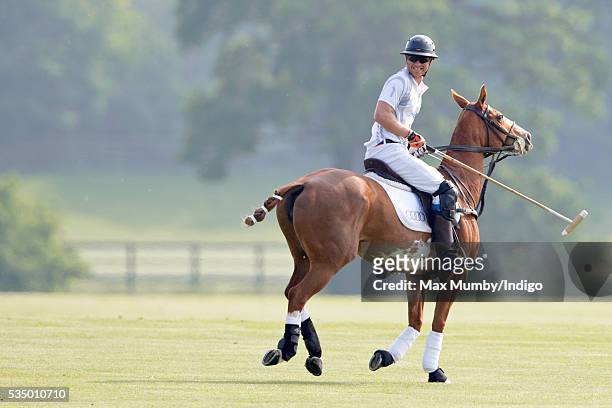 Prince Harry takes part in the Audi Polo Challenge at Coworth Park Polo Club on May 28, 2016 in Ascot, England.