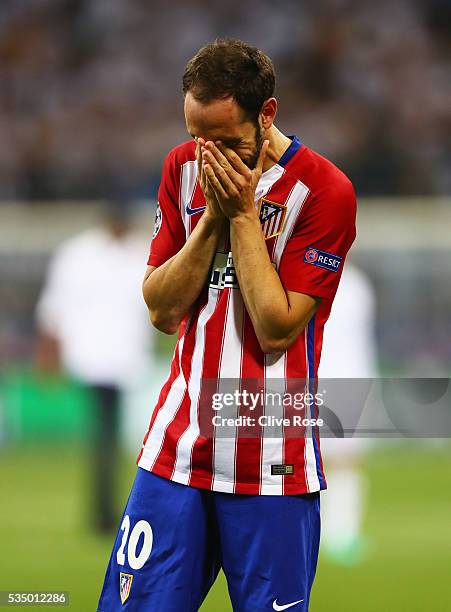 Juanfran of Atletico Madrid shows his dejection during the UEFA Champions League Final match between Real Madrid and Club Atletico de Madrid at...