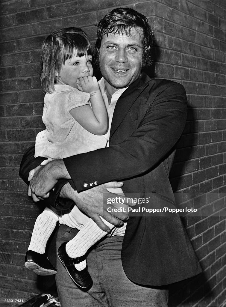 English actor Oliver Reed with his two year-old daughter Sarah