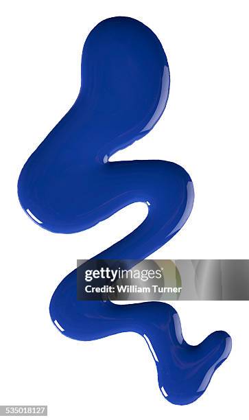 a cut out beauty product shot of blue nail polish - spilla bildbanksfoton och bilder