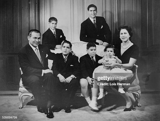 Cuban President Fulgencio Batista posing with his family. Batista was president of Cuba from 1940-1944, reelected in 1954 and then overthrown by...