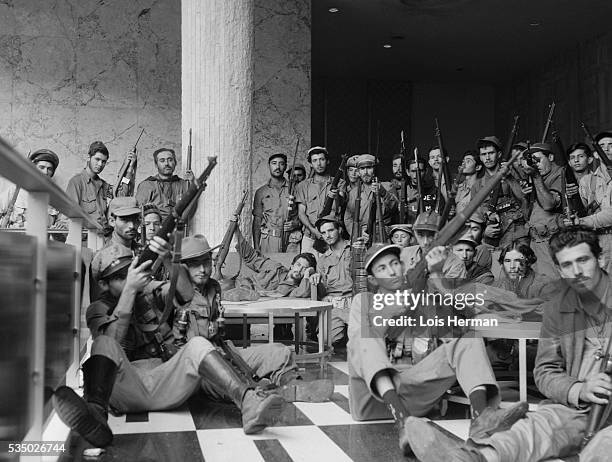 Cuban rebel soldiers in the lobby of the Hilton Hotel, Havana, Cuba, 1/59.