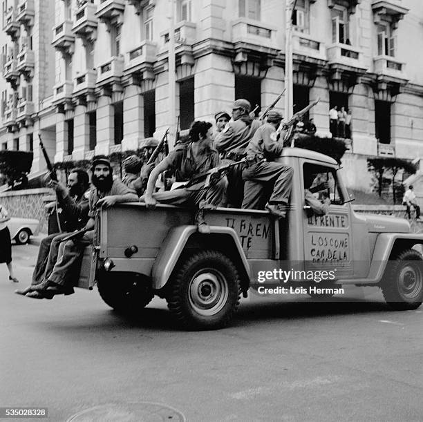 Arrival of Cuban rebel soldiers in Havana, up 23rd St.; Havana, Cuba.