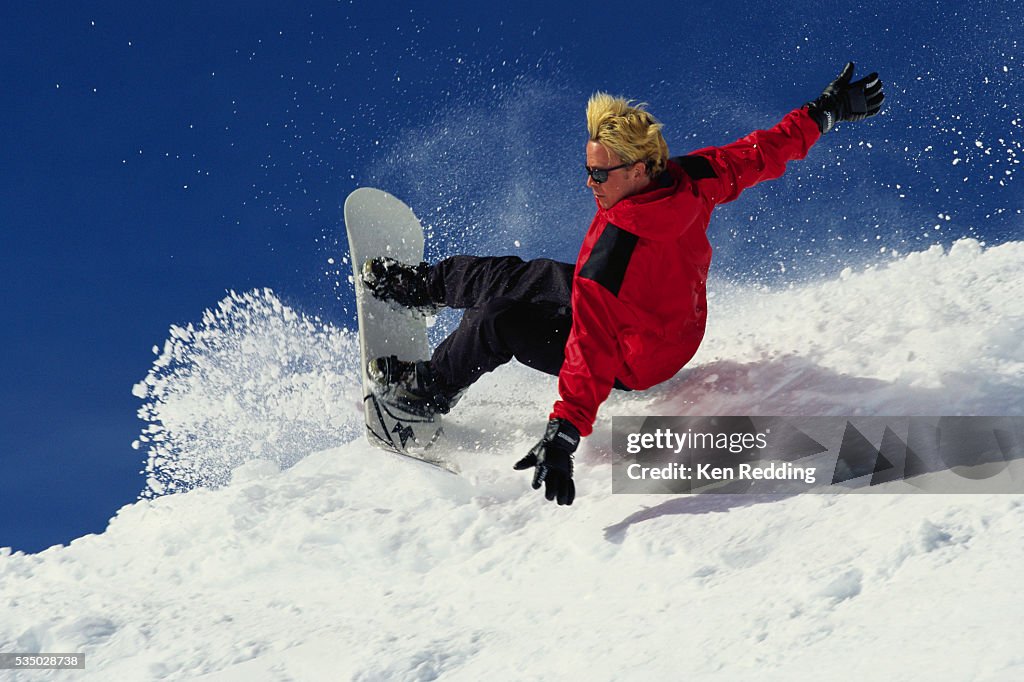 Snowboarder Performing Heelside Turn