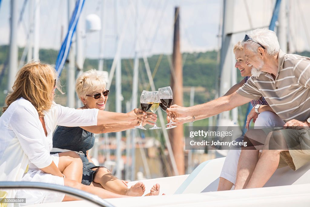 Friends Toasting Wineglasses On Yacht