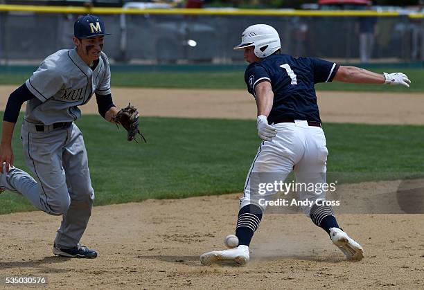 Mullen pitcher Joey Salvato, #6, left, goes after the ball and get Eric Cox, #1, Cherokee Trail, in a pickle who eventually gets thrown out in the...