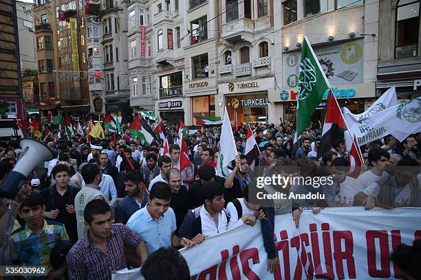 People attend 'Free Jerusalem March' organized by IHH Humanitarian Relief Foundation on May 28, 2016 in Istanbul on the 6th anniversary of the 31 May...