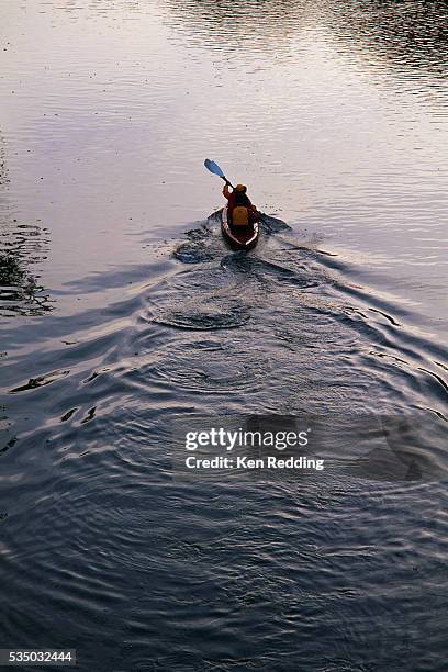 canoeing on a lake - lake solitude (new hampshire) stock pictures, royalty-free photos & images