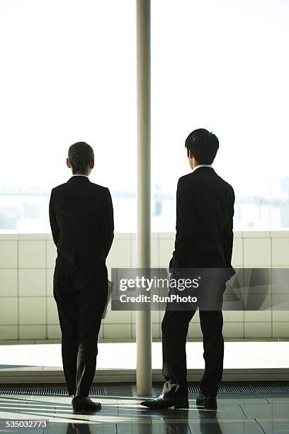 asian businessman - rear view ストックフォトと画像