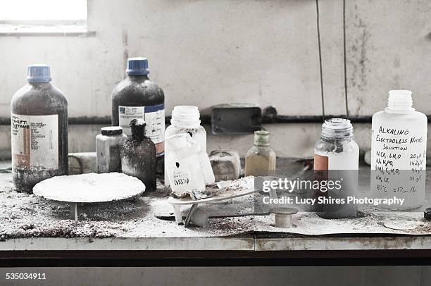 chemicals in abandoned chemical laboratory. - lucy shires stockfoto's en -beelden