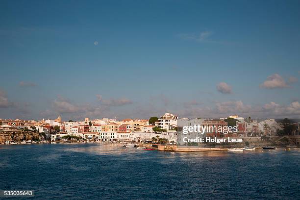 es castell on mahon harbor with full moon - menorca stockfoto's en -beelden