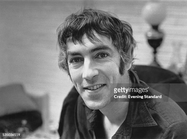 English actor, satirist, writer and comedian Peter Cook at his home in Notting Hill, London, 21st August 1972.