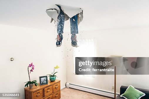 Man breaks ceiling drywall while doing DIY Man breaks ceiling drywall while doing DIY