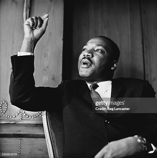 American civil rights leader Martin Luther King, Jr at a press conference in London, September 1964.