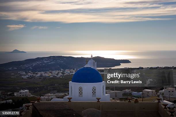 Sunset over the island from the church at Megalochori, Santorini