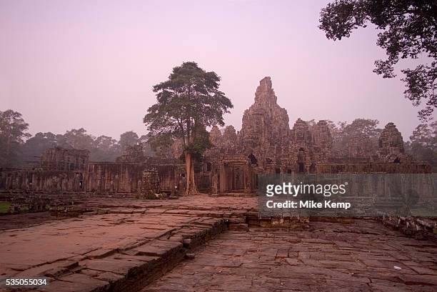 Dawn scene at Bayon, the central state-temple at the heart of Angkor Thom. Built in the late 12th century, Bayon is adorned with stunning bas-reliefs...