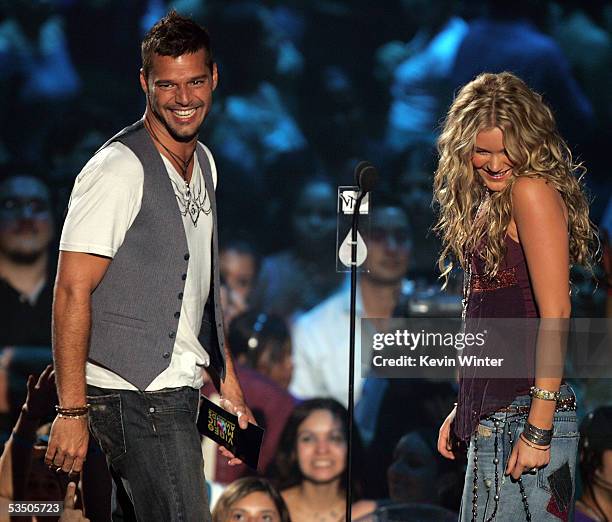 Singers Ricky Martin and Joss Stone present on stage during the 2005 MTV Video Music Awards at the American Airlines Arena on August 28, 2005 in...