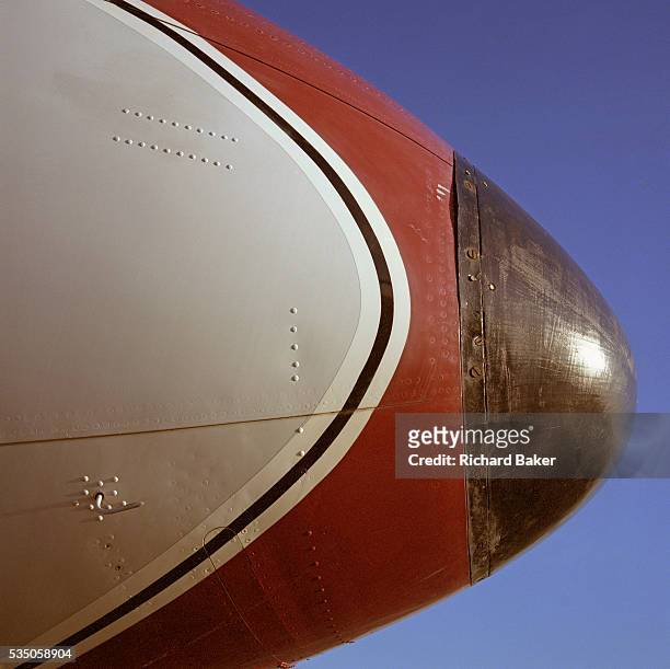 The nose detail of a de Havilland Comet in the colours of the long-defunct airline Dan Air is seen in profile at the Imperial War Museum's Duxford...