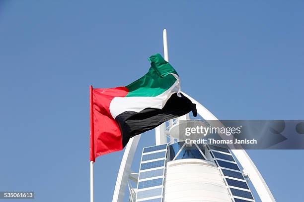 Burj Al Arab with flag, Dubai, UAE