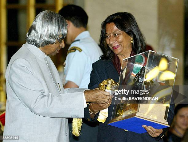 Indian women's cricket trainer Sunita Sharma receives the Dronacharya Award , the second highest sports award from Indian President A.P.J. Abdul...