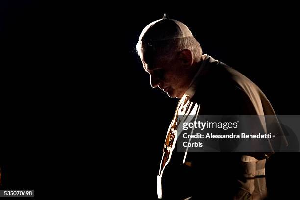 Pope Benedict XVI celebrates the Via Crucis, "Way of the Cross" at Rome's Colosseum.