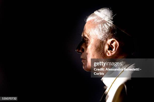 Pope Benedict XVI celebrates the Via Crucis, "Way of the Cross" at Rome's Colosseum.